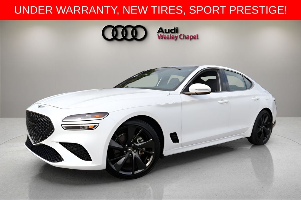 2023 Genesis G70 2.0T in Uyuni White — front three-quarter view