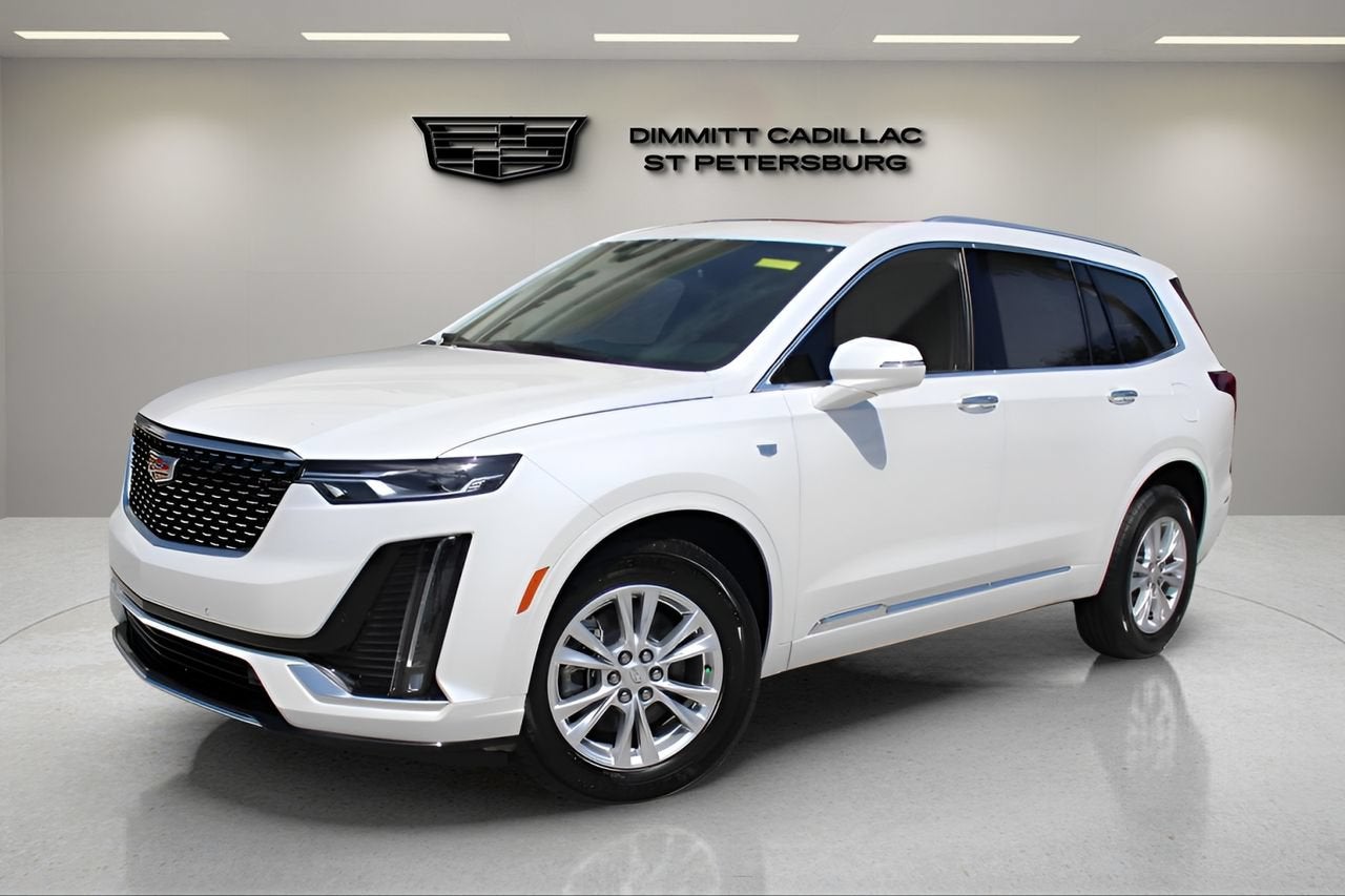 2025 Cadillac XT6 Luxury in Crystal White Tricoat — front three-quarter view
