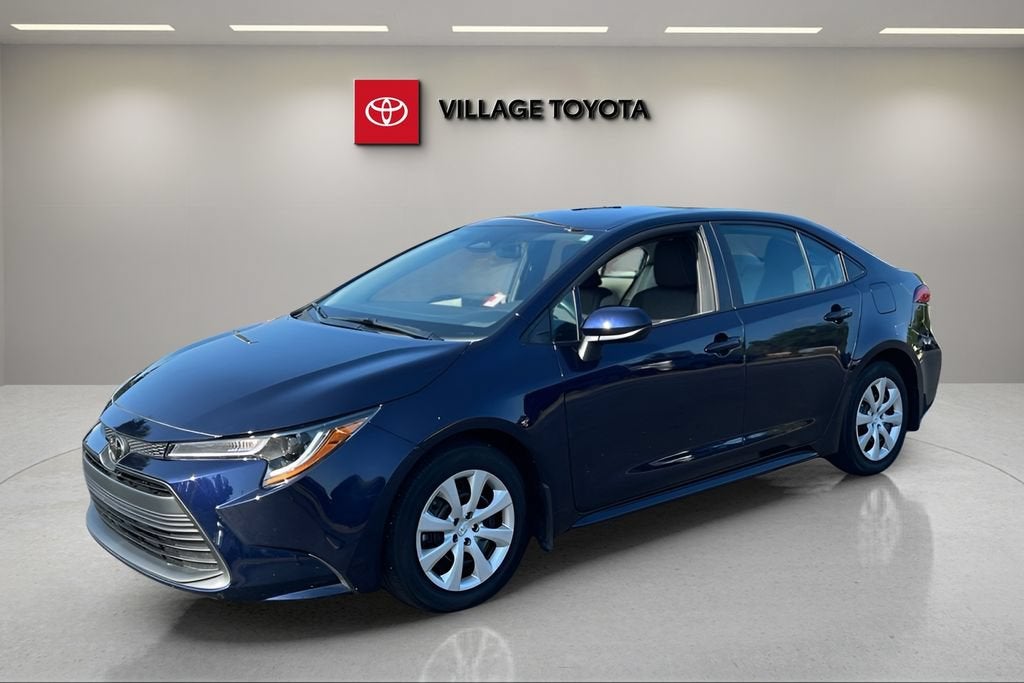 2025 Toyota Corolla LE in Blueprint — front three-quarter view