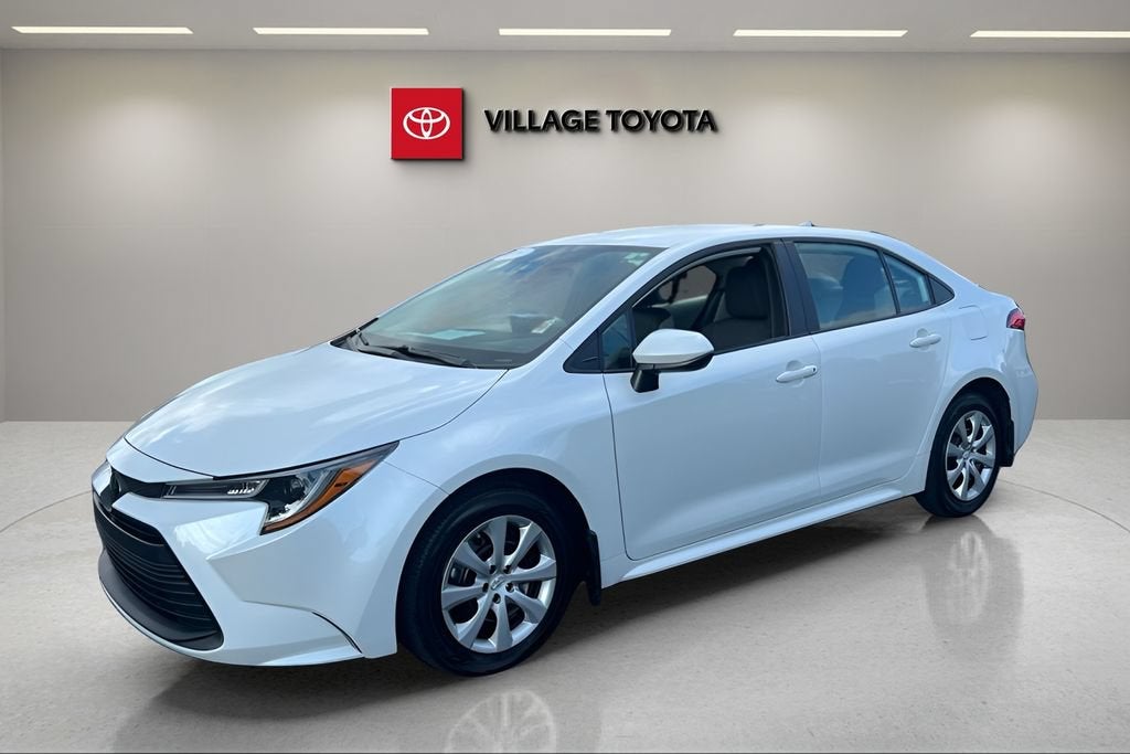 2025 Toyota Corolla LE in Wind Chill Pearl — front three-quarter view