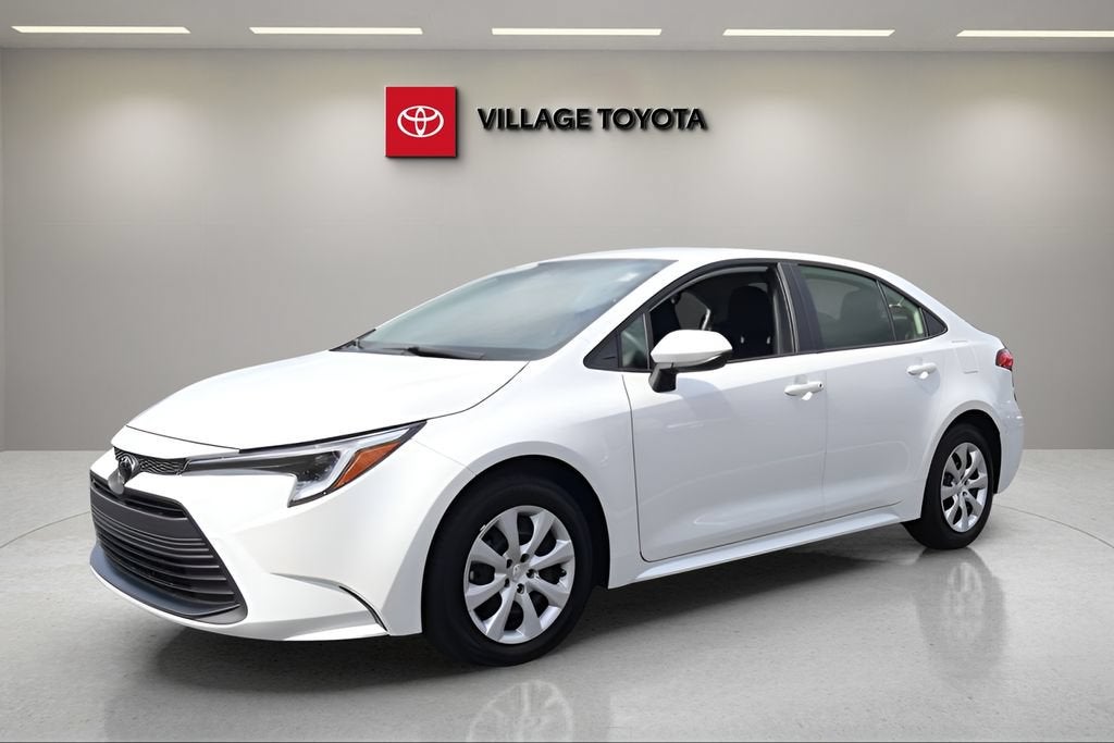 2026 Toyota Corolla Hybrid LE in Wind Chill Pearl — front three-quarter view